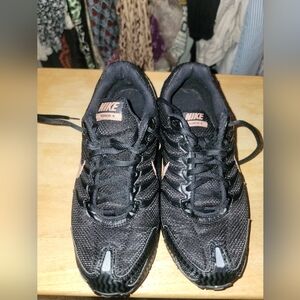 Nike Women's Black Athletic Running Sneakers with Pink Accents